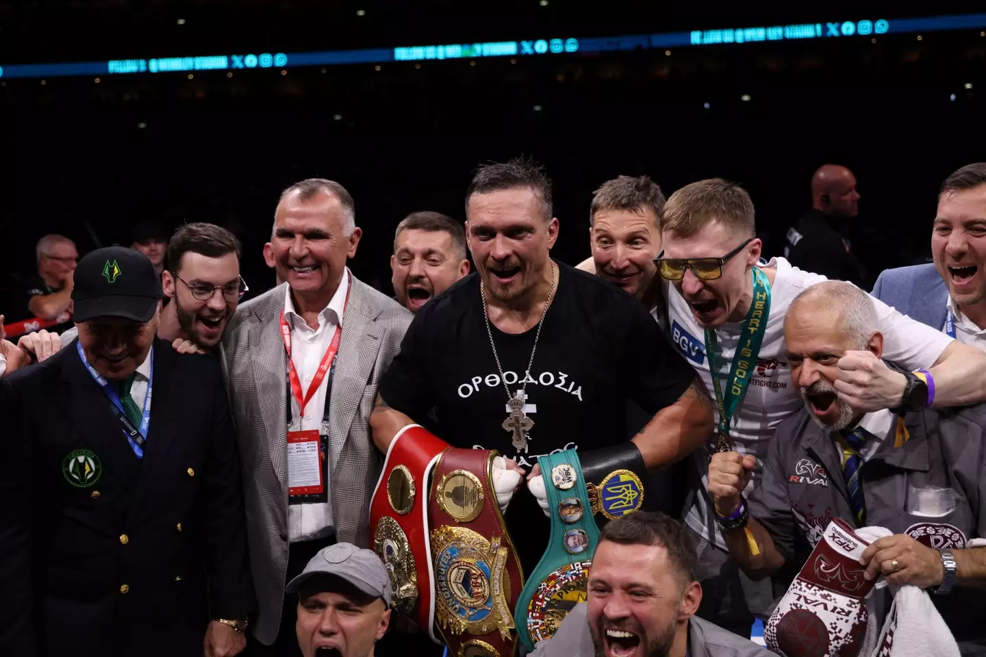 Oleksandr Usyk celebrates after beating Daniel Dubois to win the WBC title. Image: Getty