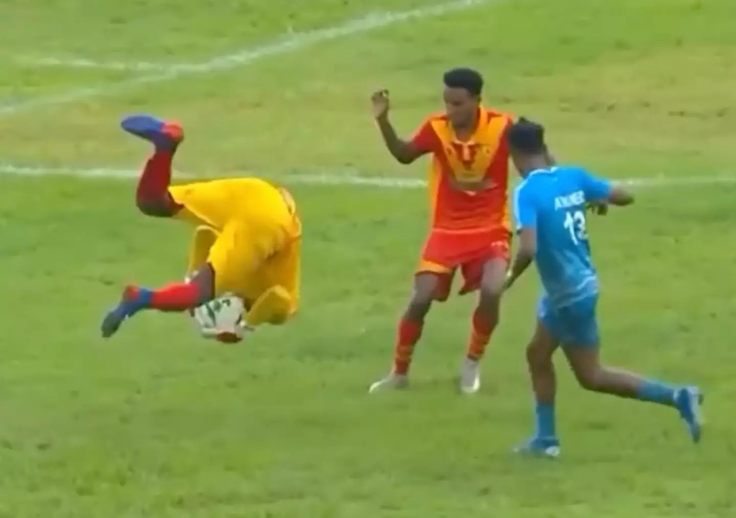 Bahir Dar goalkeeper Harriston Hessou flips into an opposing player (Image: Ethiopian Premier League)