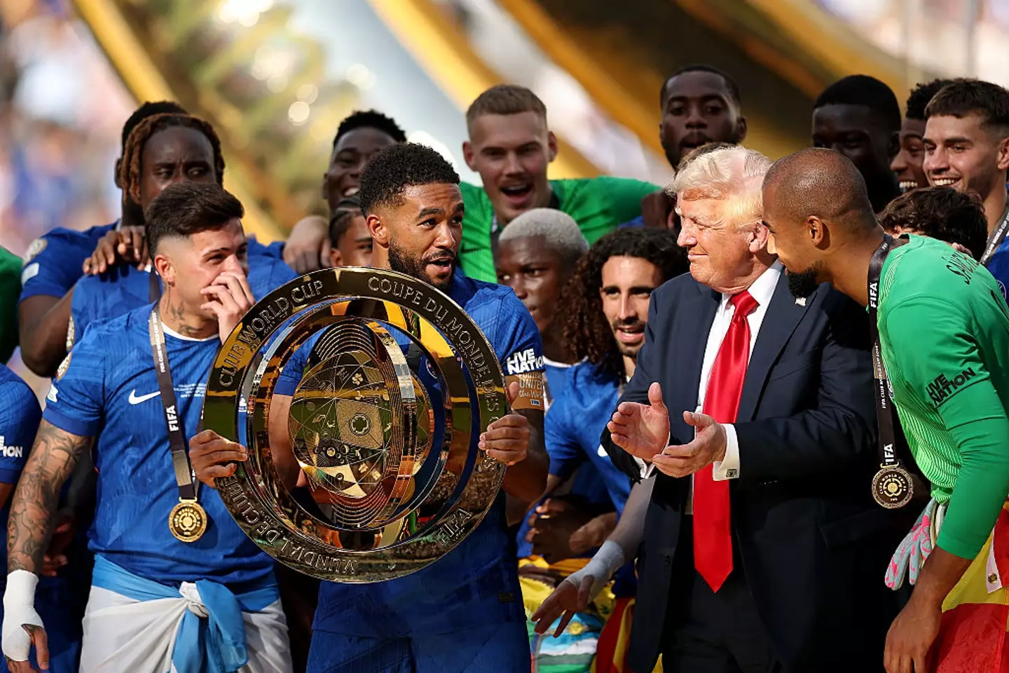 Donald Trump alongside the Chelsea squad (Credit:Getty)