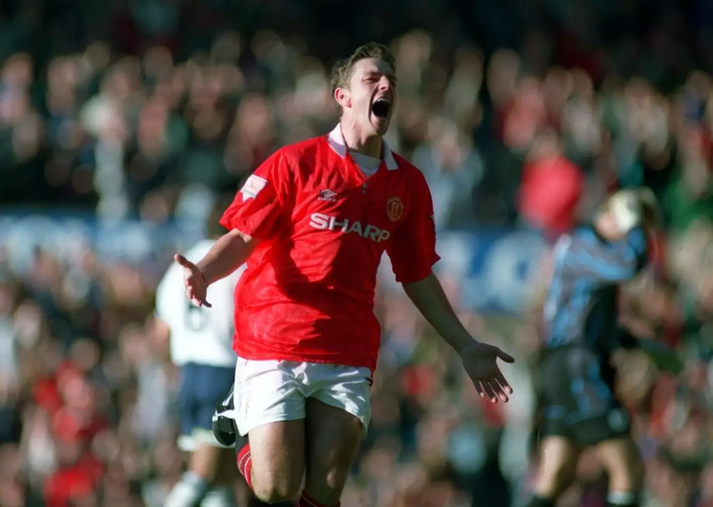 Lee Sharpe celebrates scoring for Man Utd in October 1993 (Image: Getty)