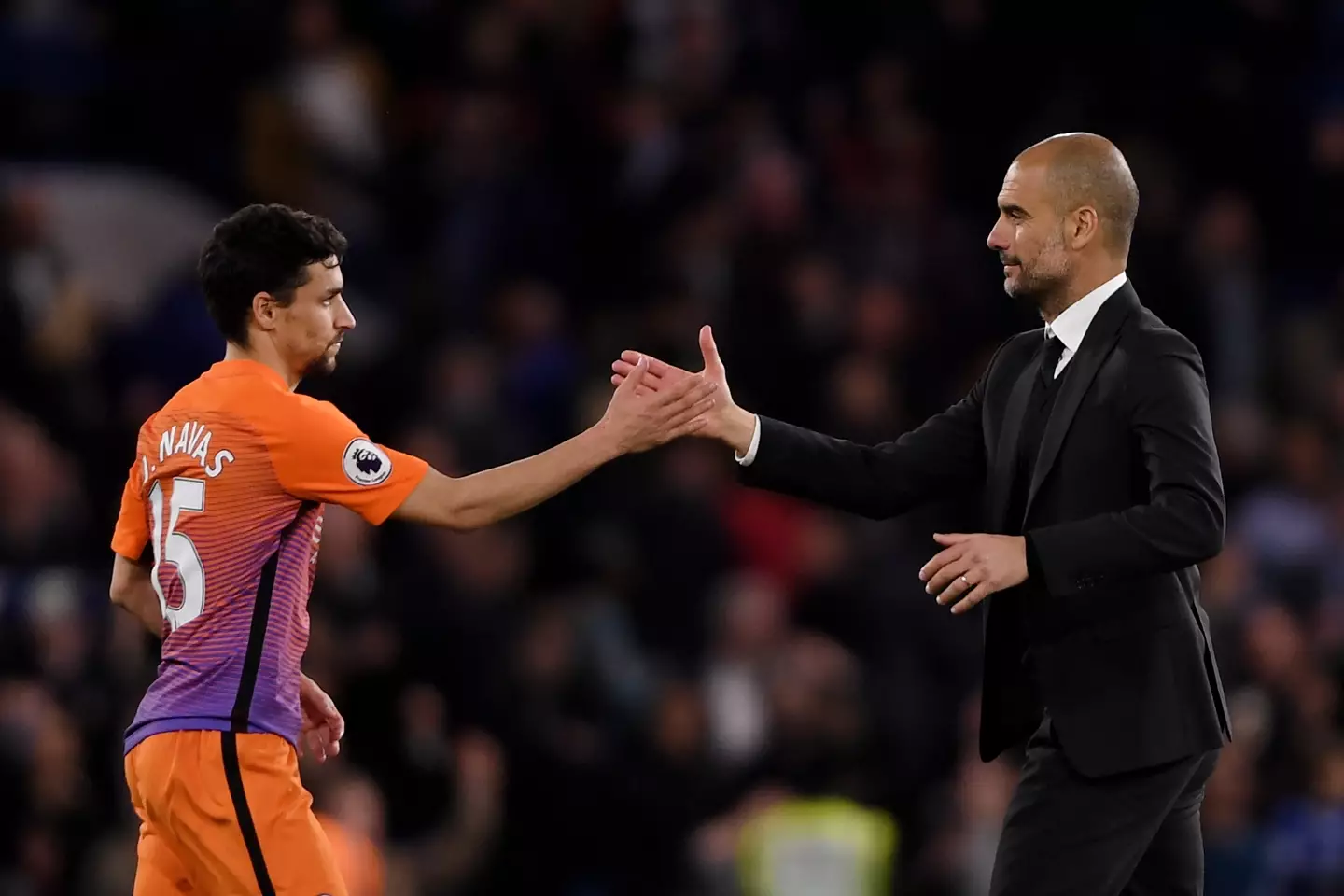 Jesus Navas and Pep Guardiola. (Image: Getty)