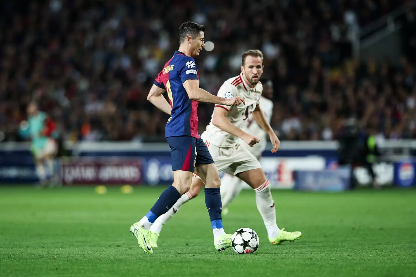 Harry Kane and Robert Lewandowski playing against each other in the Champions League. Image: Getty