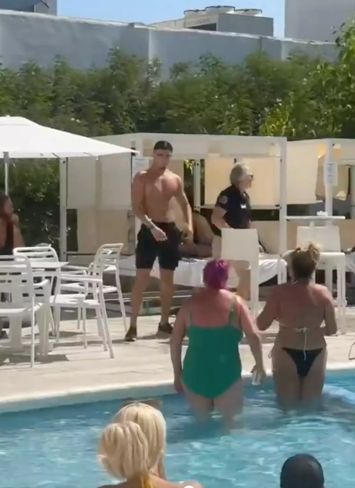 Harratt was confronted after launching a chair in the direction of a woman. Image credit: TikTok/@2tops2