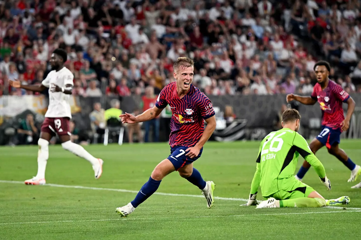 Dani Olmo celebrates scoring a goal. Image: Getty