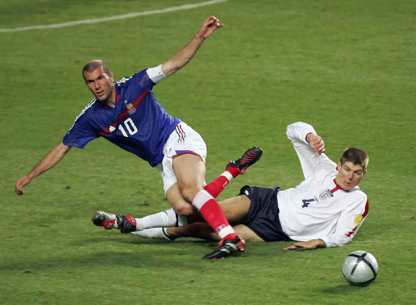Zinedine Zidane and Steven Gerrard during a game between France and England at Euro 2004. Image: Getty