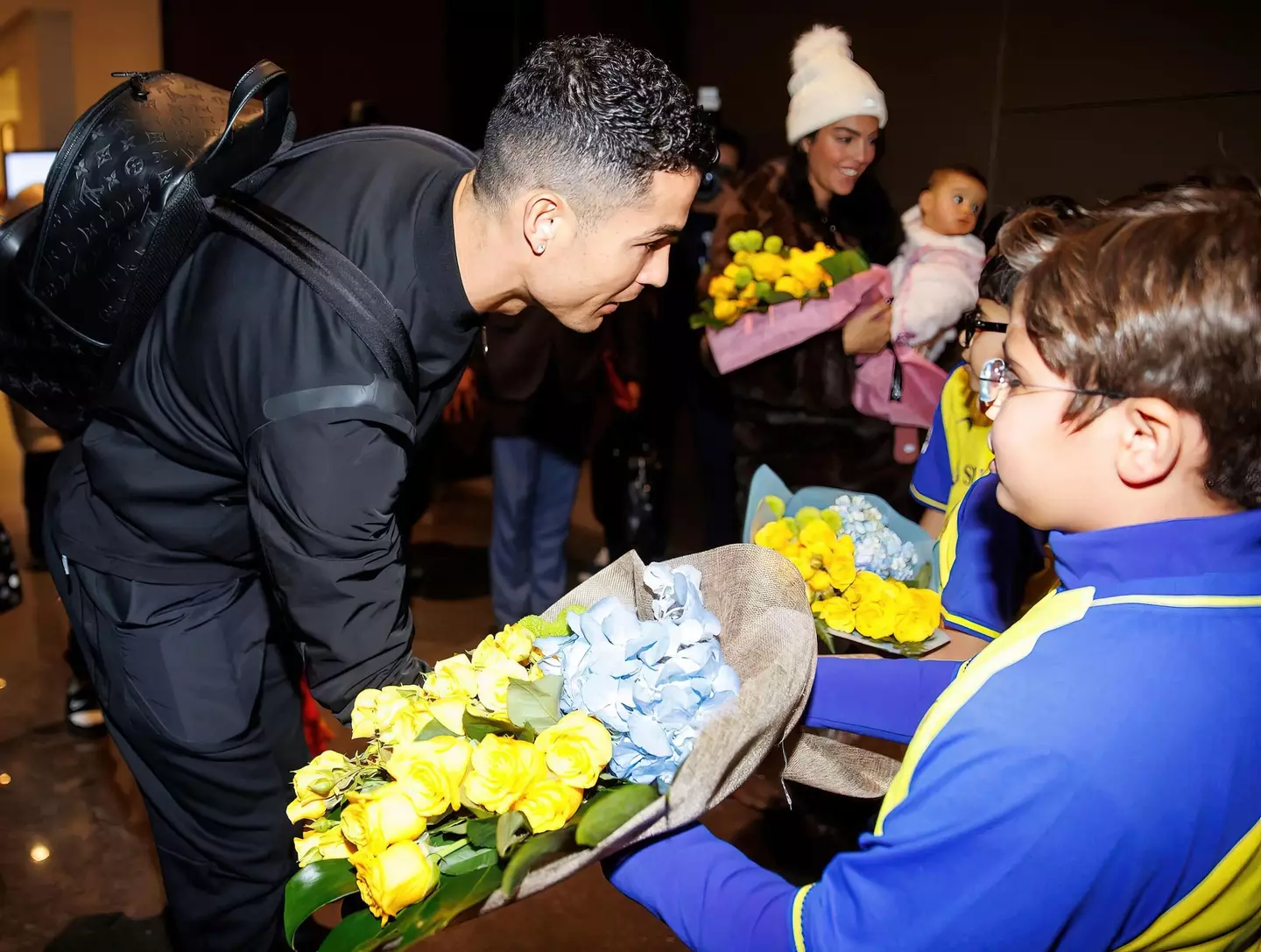 Cristiano Ronaldo welcomed by Al Nassr fans at King Khalid International Airport in Saudi Arabia on Monday.
