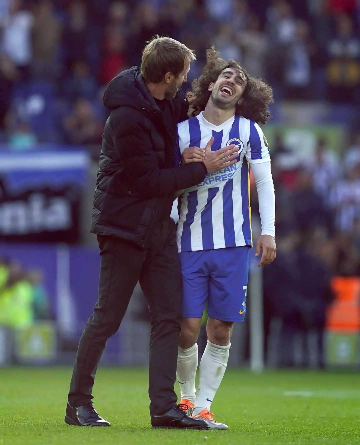 Brighton and Hove Albion manager Graham Potter celebrates with Marc Cucurella after the fans after the Premier League match at the AMEX Stadium, Brighton. (Alamy)
