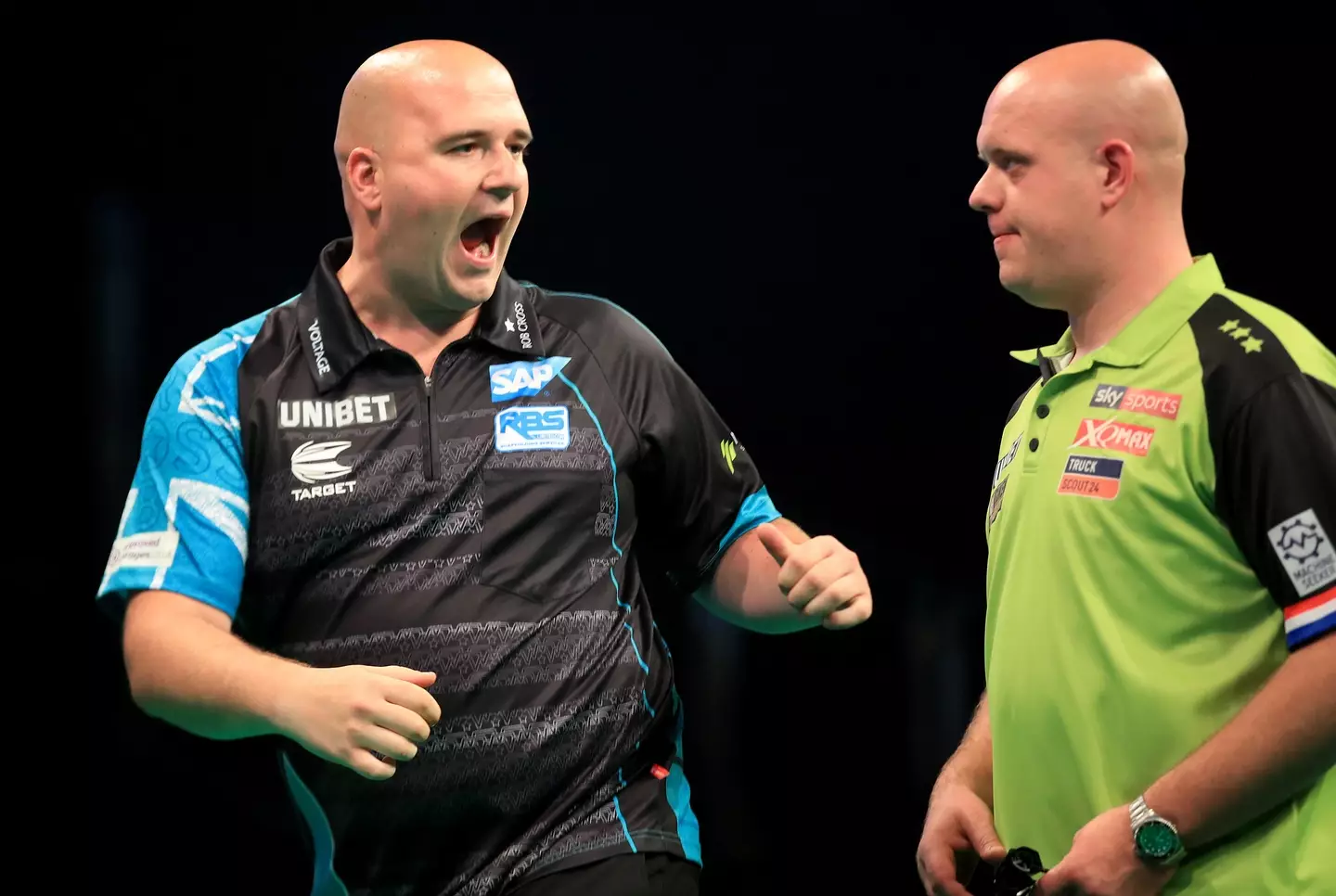 Cross wouldn't sign the green shirt associated with rival Van Gerwen. Image: Alamy