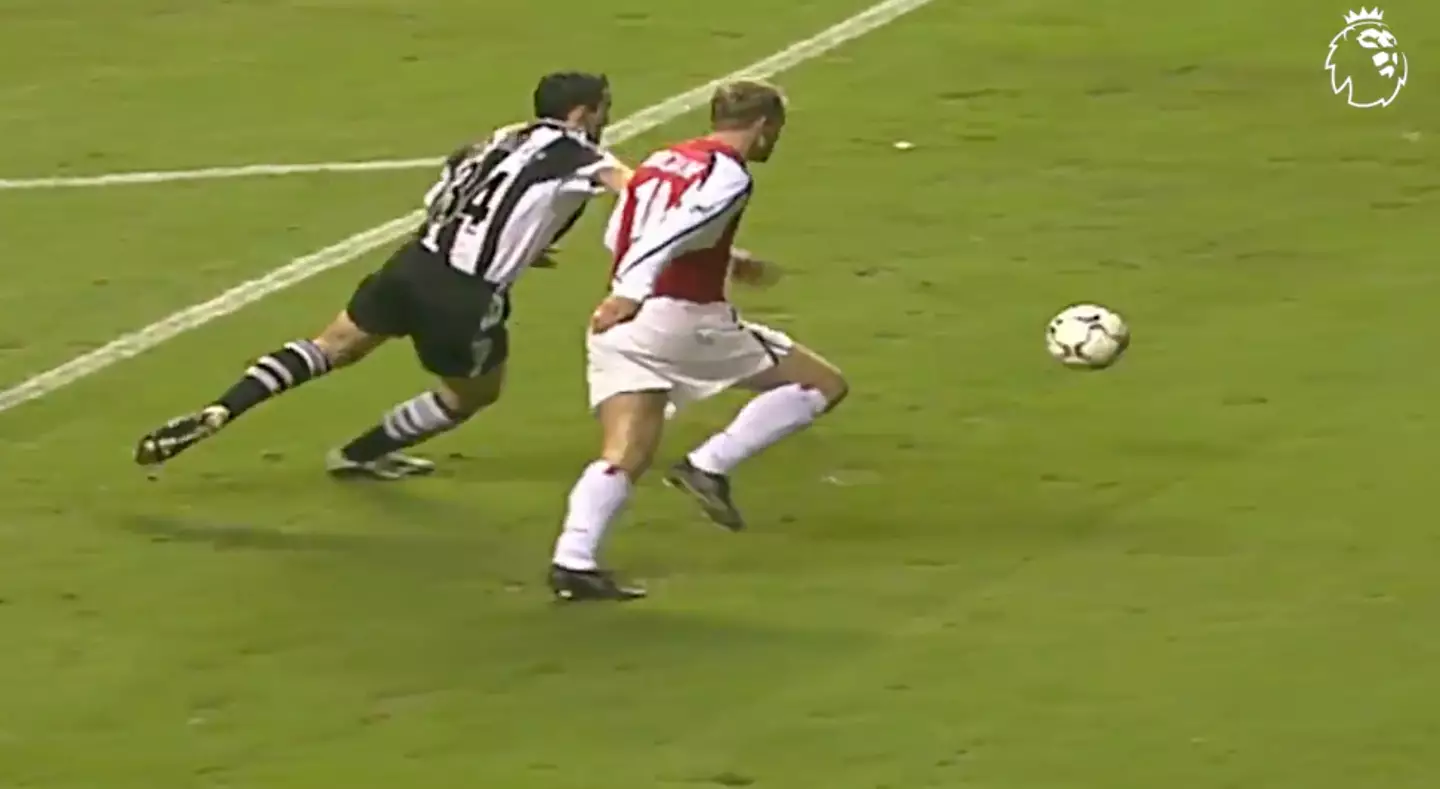 Bergkamp beats Dabizas to the ball. Image: Premier League