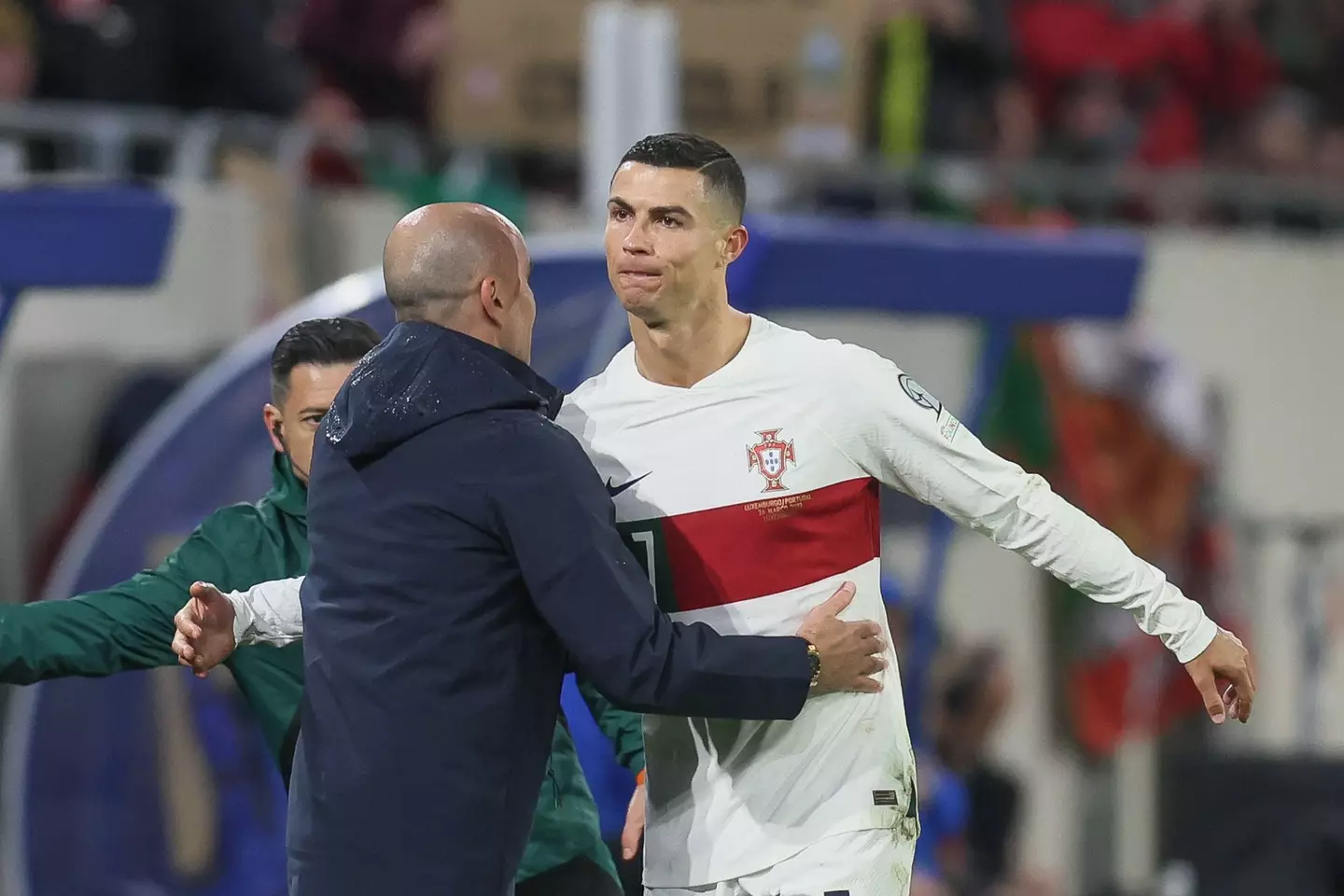 Roberto Martinez and Cristiano Ronaldo embrace during Portugal's game against Luxembourg. Image: Alamy