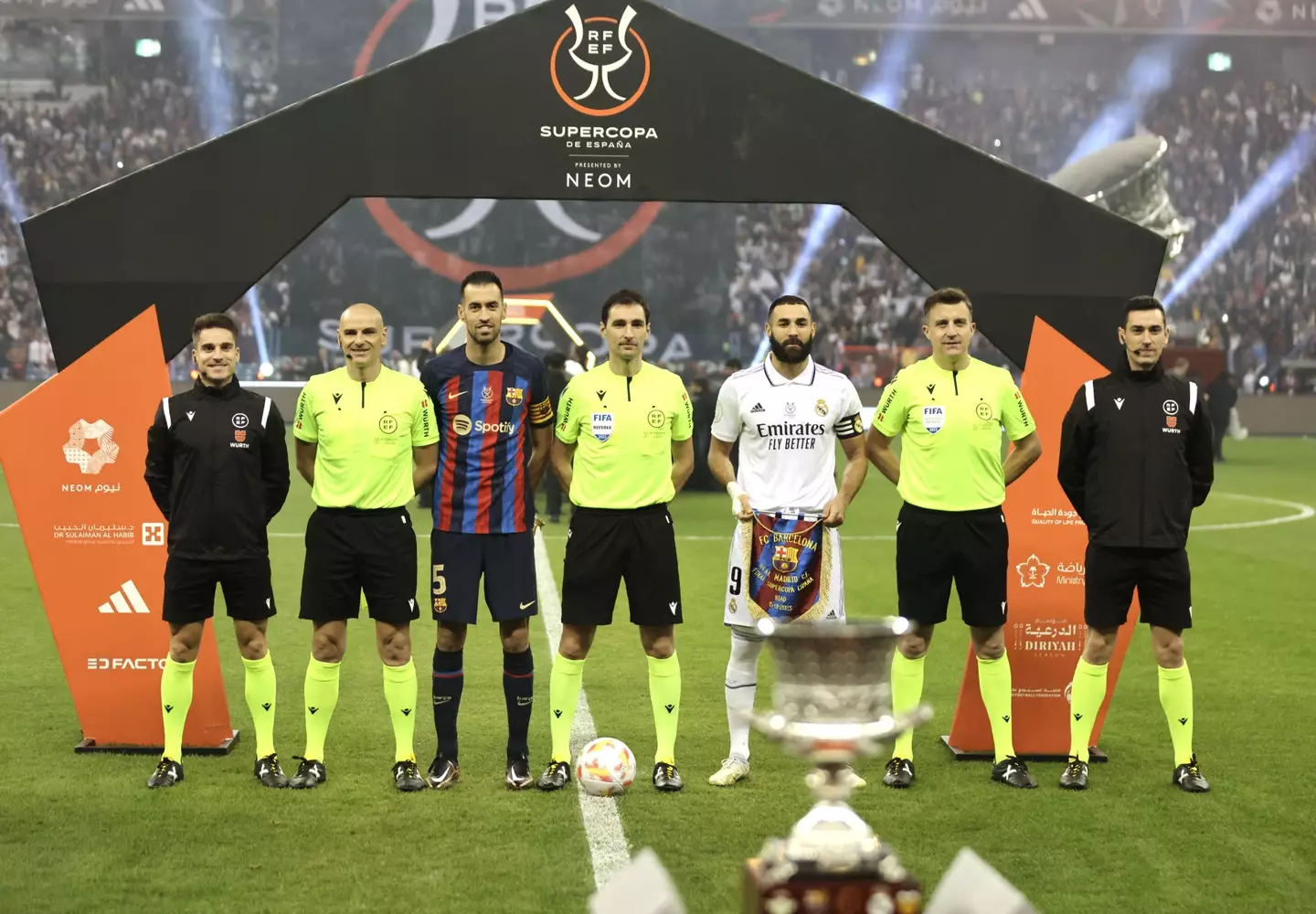 The Barcelona and Real Madrid captains with the officials before their game (