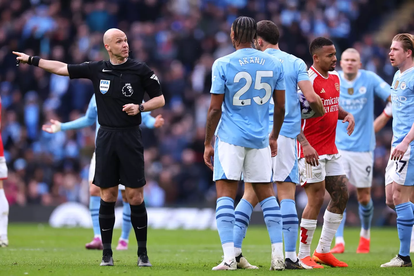 Manchester City players react to a decision made by Anthony Taylor. Image: Getty