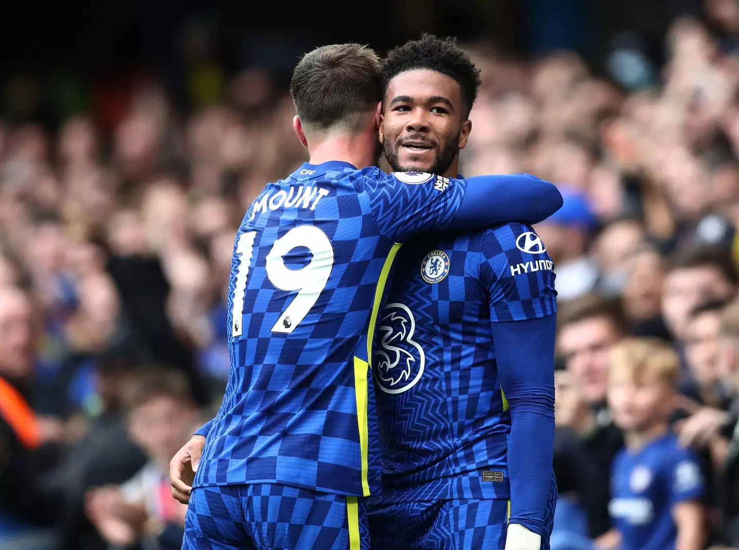 Mason Mount embracing Reece James. (Alamy)