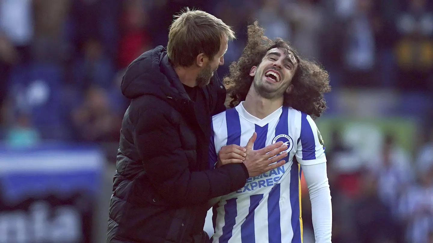 Brighton manager, Graham Potter with Marc Cucurella.