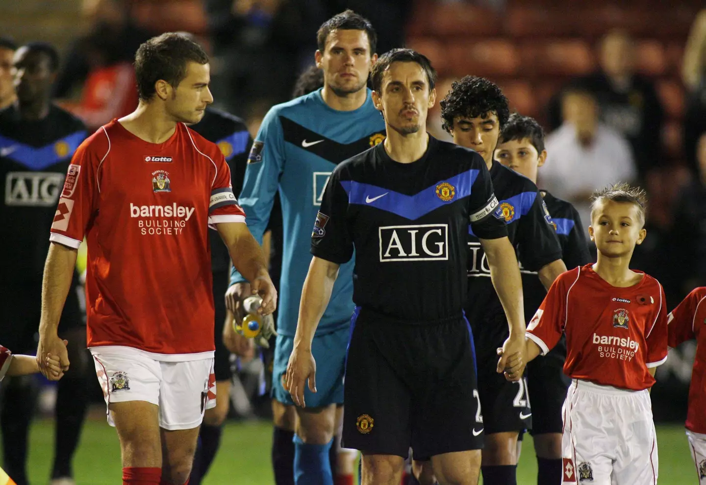 Foster approached Neville for contract advice while at Manchester United (Image: Alamy)