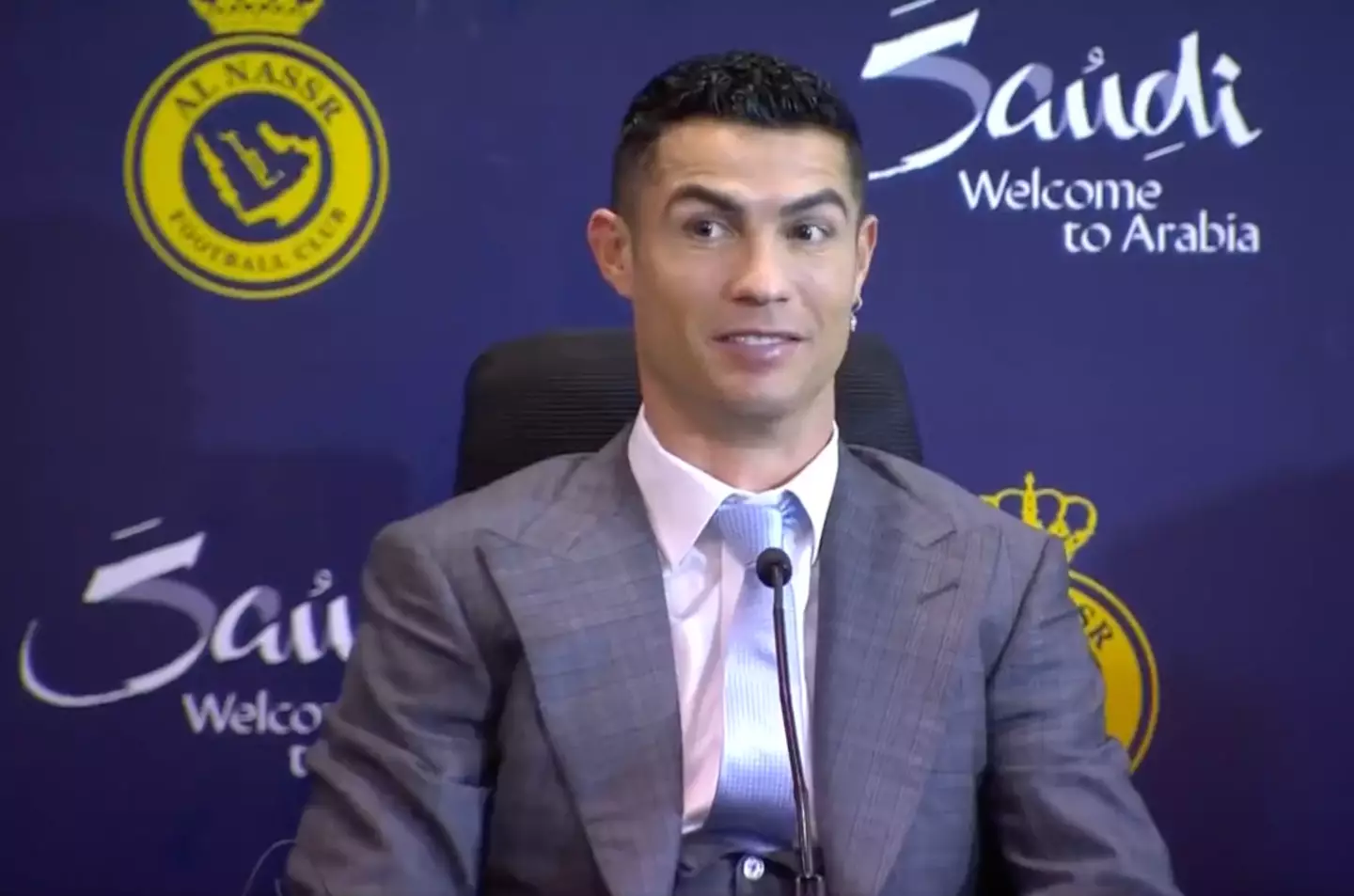 Ronaldo's initial reaction earlier in the press conference. (Image