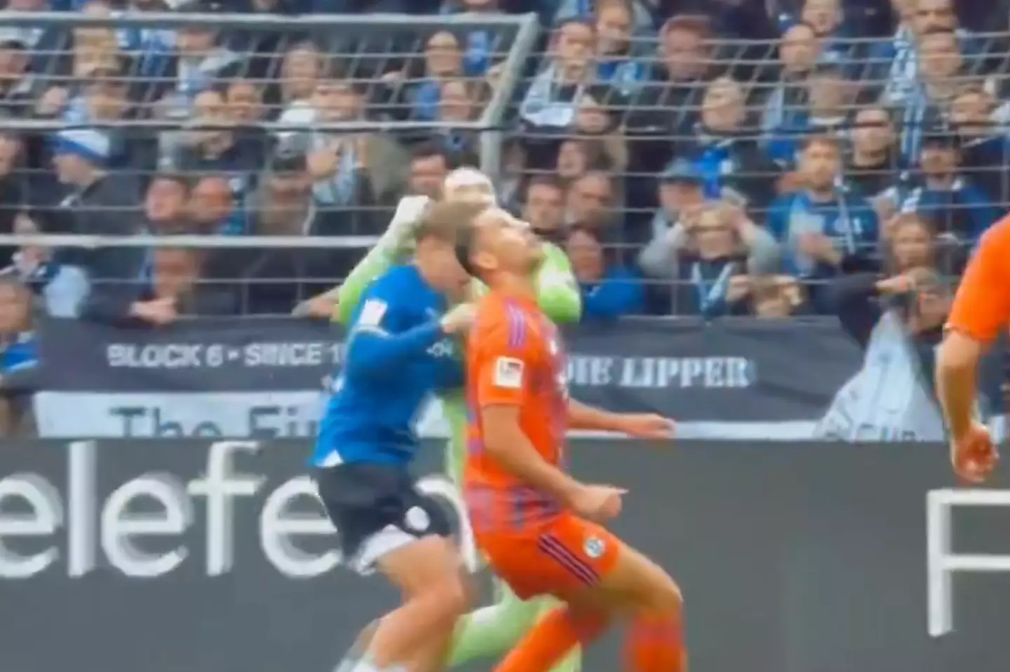 Karius collided with Grodowski (in blue) in the second half (Image: DFL)