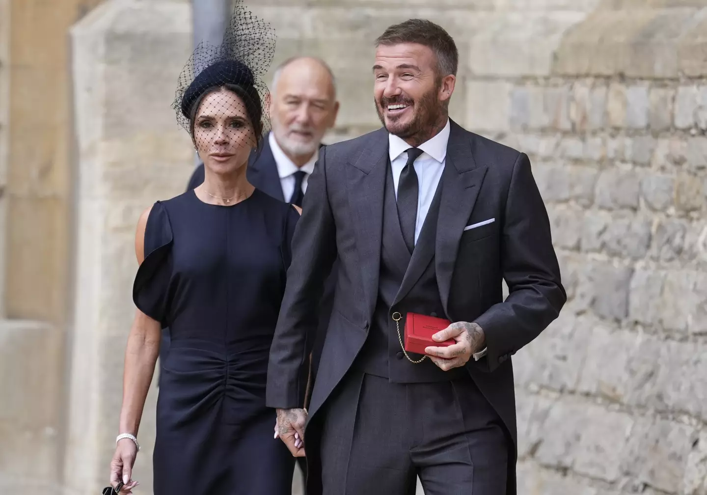 David Beckham with his wife Victoria at Windsor Castle (Image: Getty)