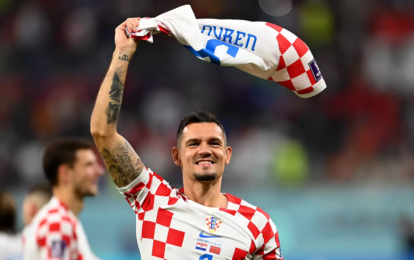 Dejan Lovren celebrates Croatia's win over Brazil at the 2022 World Cup.