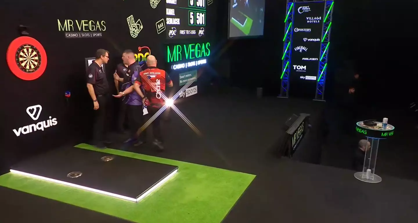 Daryl Gurney clashes with Kirk Bevins after his Grand Slam defeat to Karel Sedlacek. Image credit: PDC