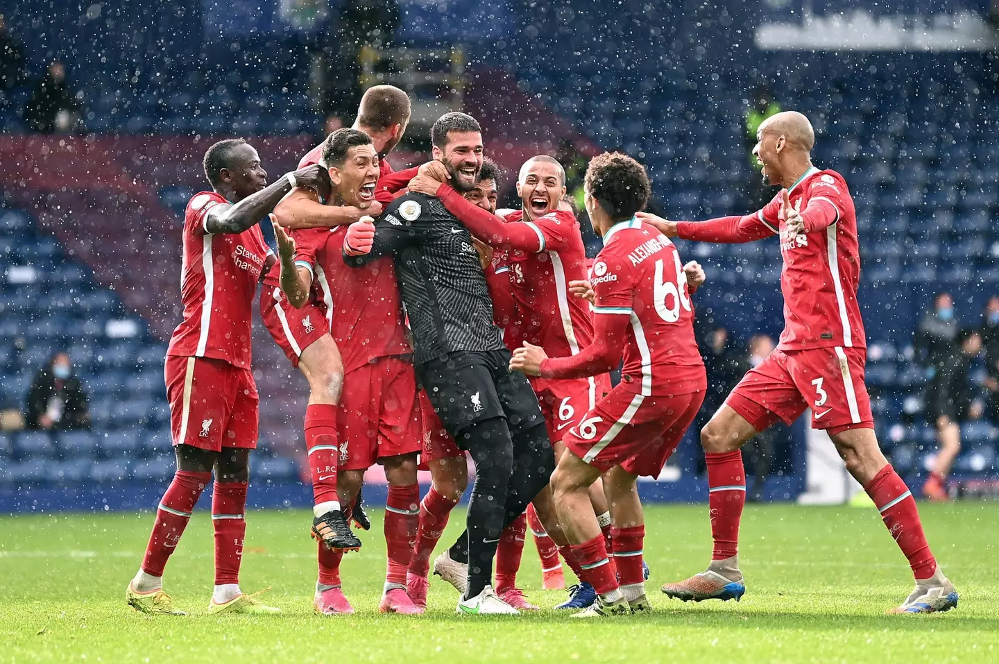 Alisson celebrates his dramatic winner against West Brom (Image: PA)