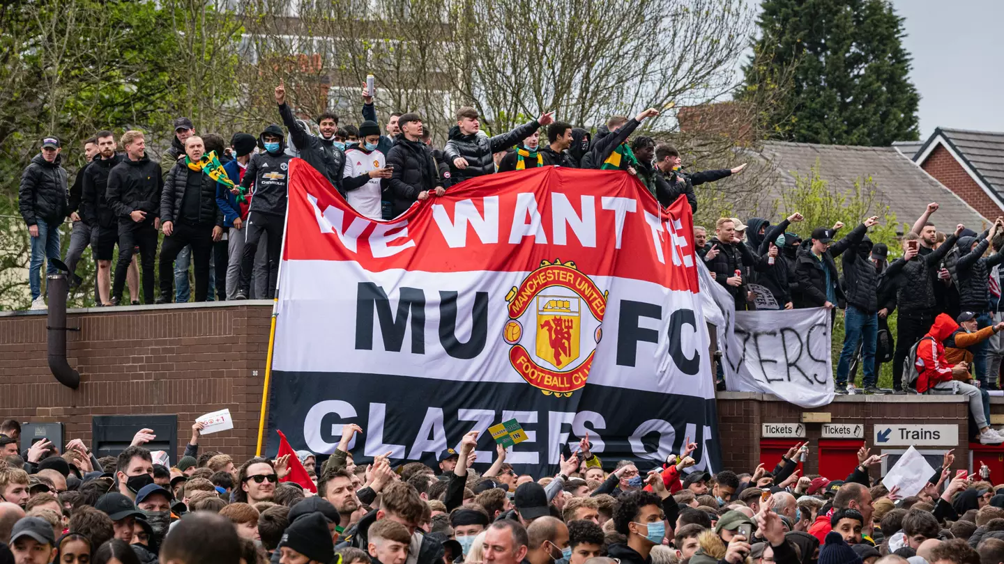 Manchester United supporters during a  'Glazers Out' protest. (Alamy)