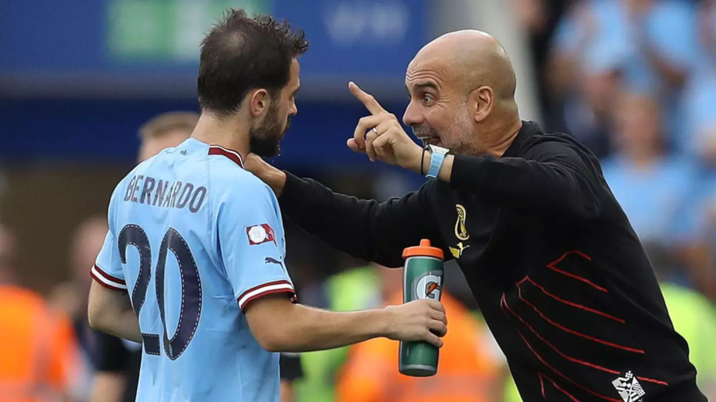 Pep Guardiola provides instructions to Bernardo Silva.