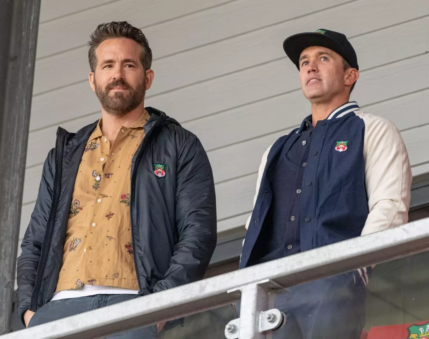 Ryan Reynolds and Rob McElhenney in the stands at Wrexham. (Image: Alamy)