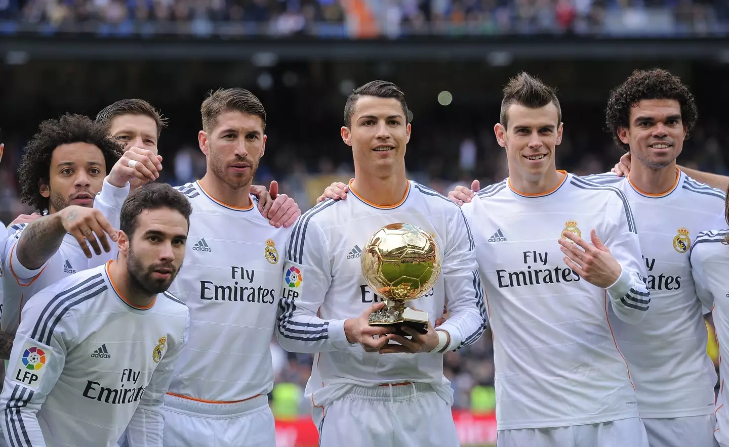 Ronaldo with his Real Madrid teammates after winning the 2013 award.