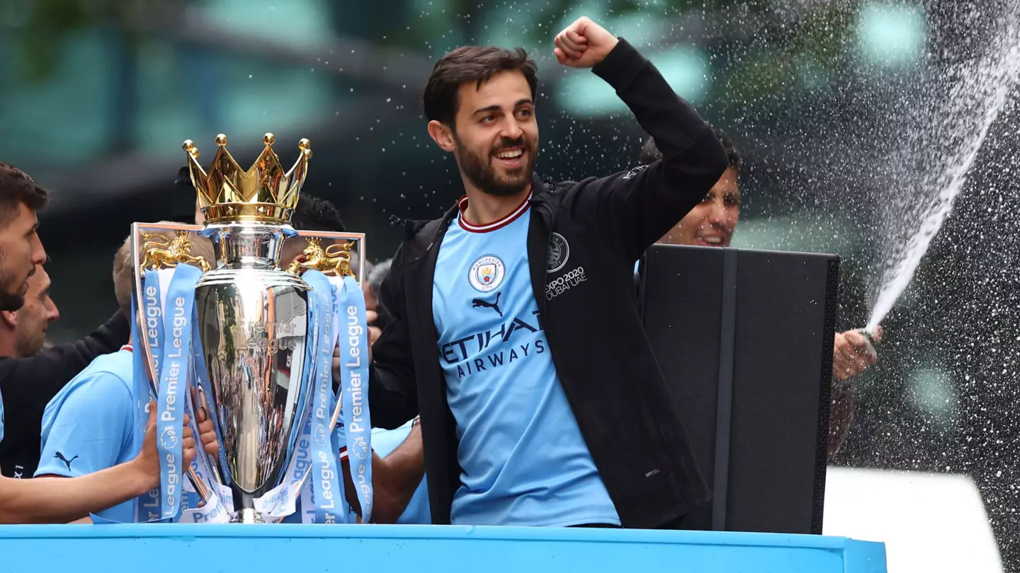 Bernardo Silva celebrates Manchester City's Premier League trophy success.