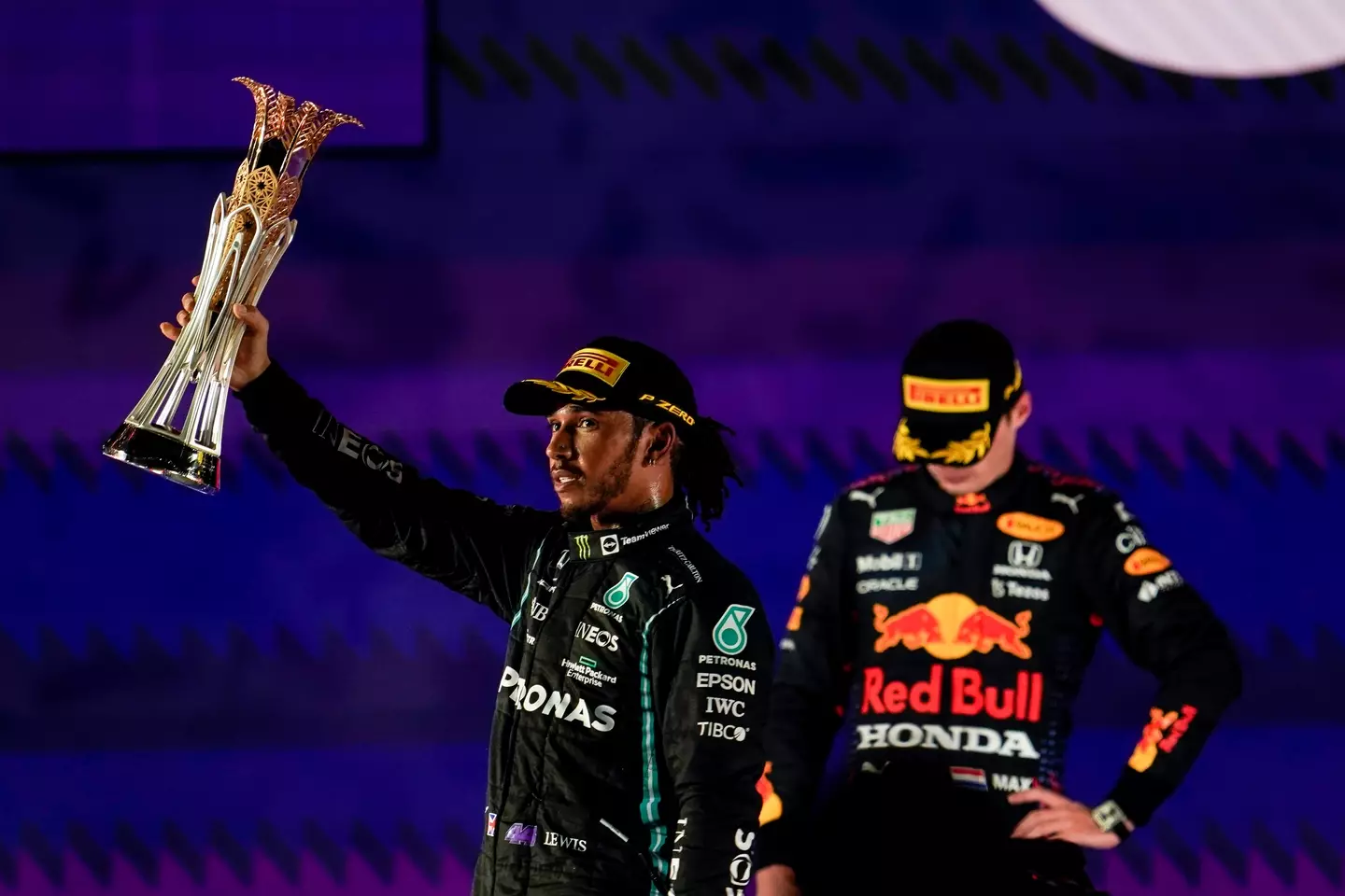 Hamilton celebrates in Saudi Arabia but Verstappen was very unhappy with the result. Image: PA Images