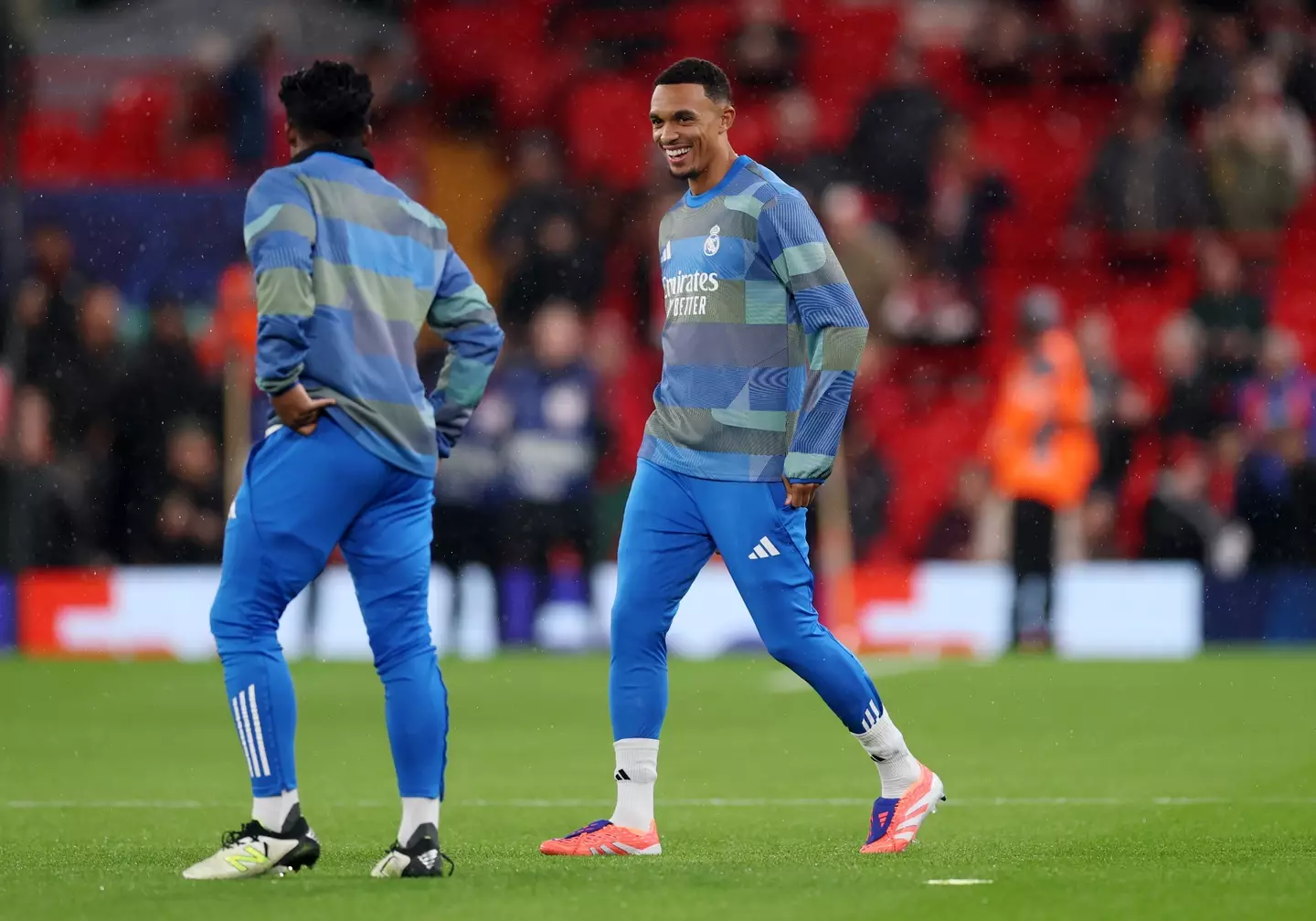 Trent Alexander-Arnold smiles as he warms up ahead of Liverpool vs. Real Madrid. Image: Getty
