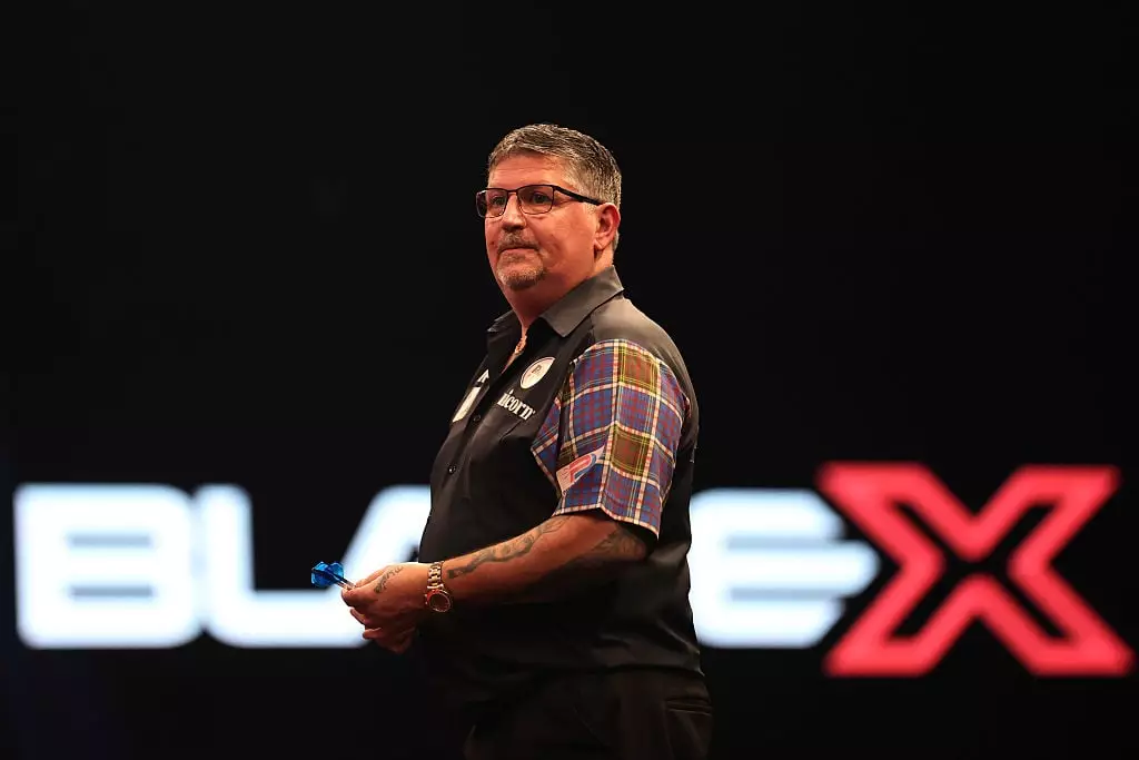 Gary Anderson won his opening match at the 2026 Winmau World Masters Darts. (Image: Shaun Brooks - CameraSport via Getty Images)