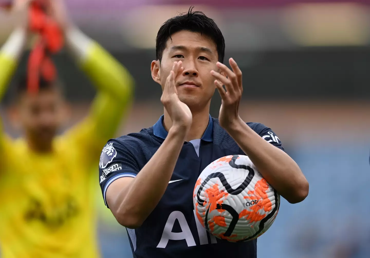 Son Heung-min takes home the match ball after scoring a hat-trick. Image: Getty