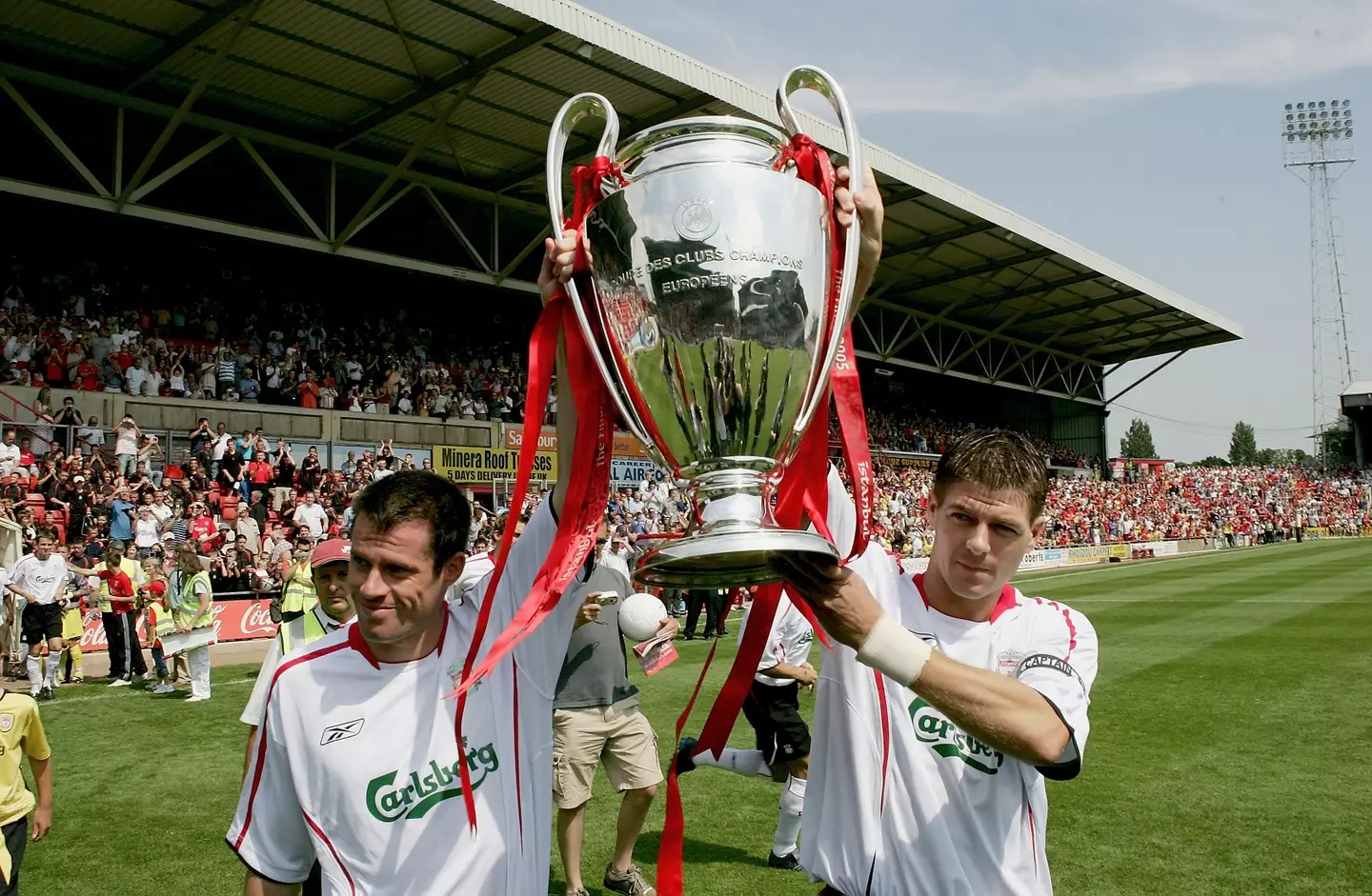 Jamie Carragher and Steven Gerrard parade the Champions League following their 2005 triumph. Image: Getty
