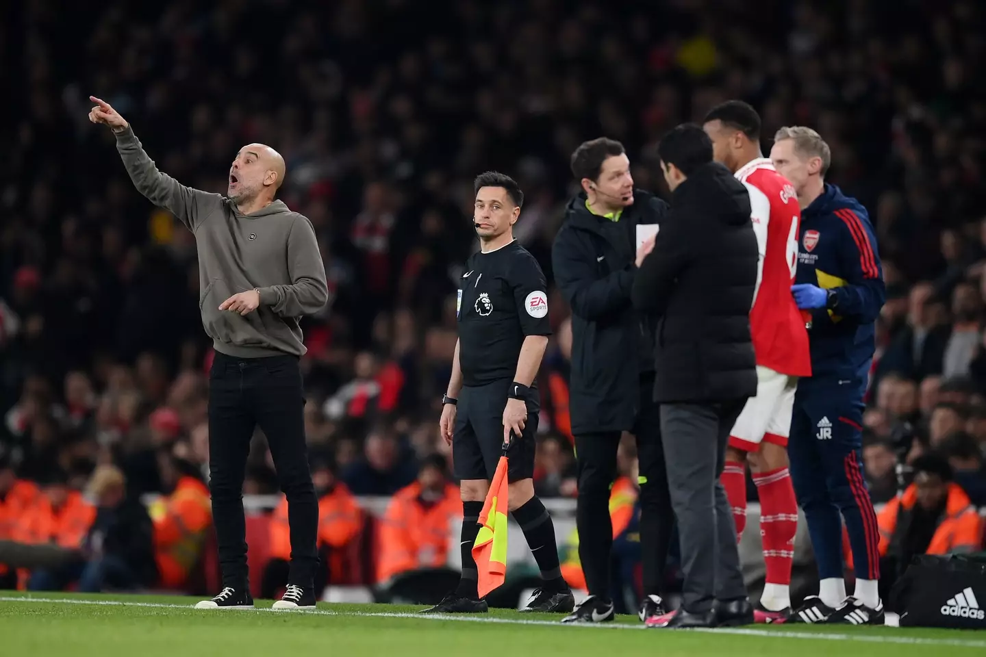Pep Guardiola and Mikel Arteta on the touchline for Arsenal vs Manchester City last season. Image: Getty