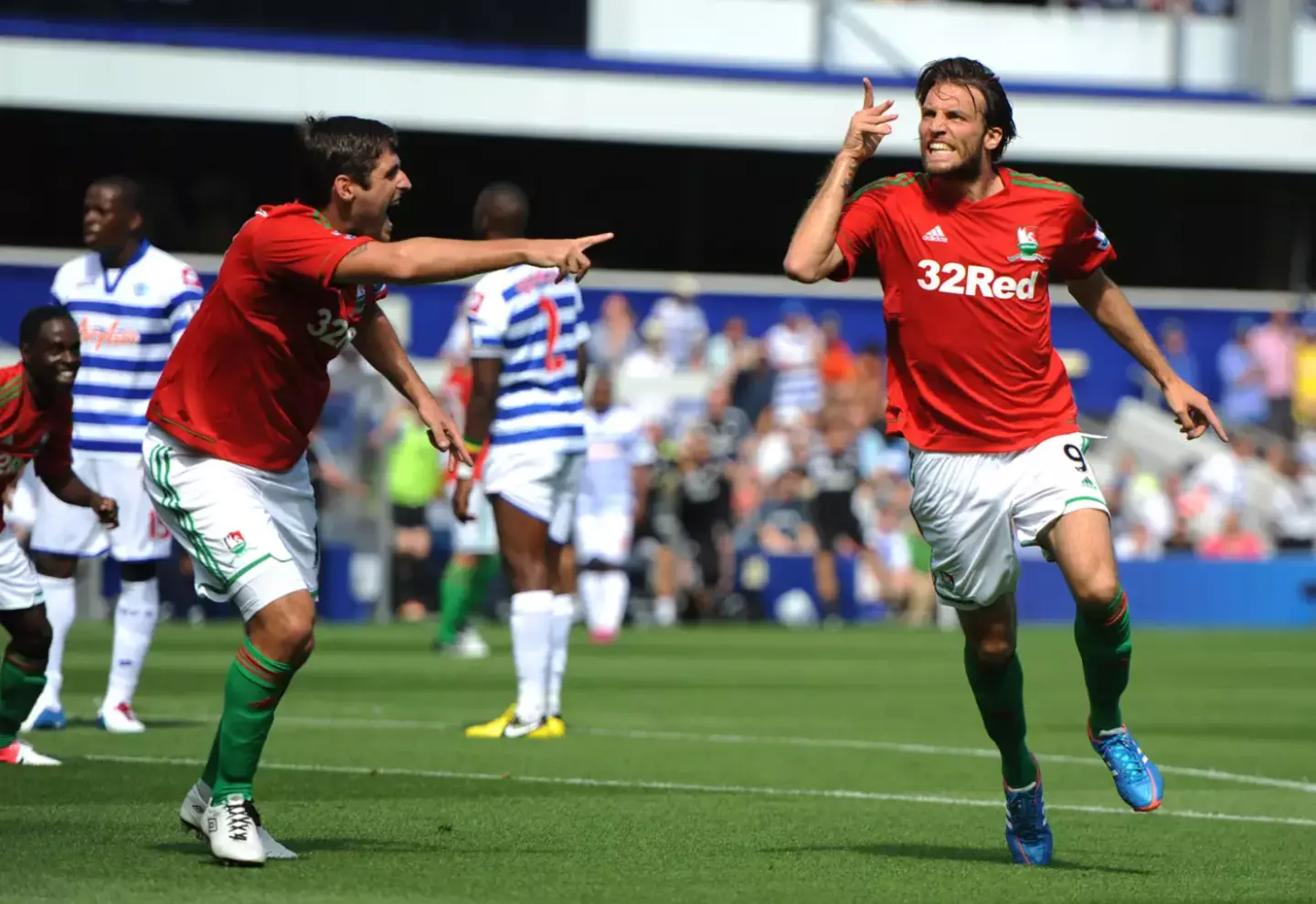 Michu celebrates after scoring against QPR on debut. Image: PA Images