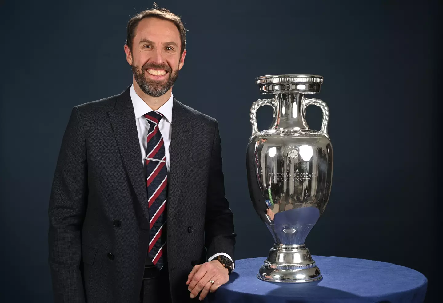 Gareth Southgate poses for a photo with the Euro 2024 trophy. Image: Getty 