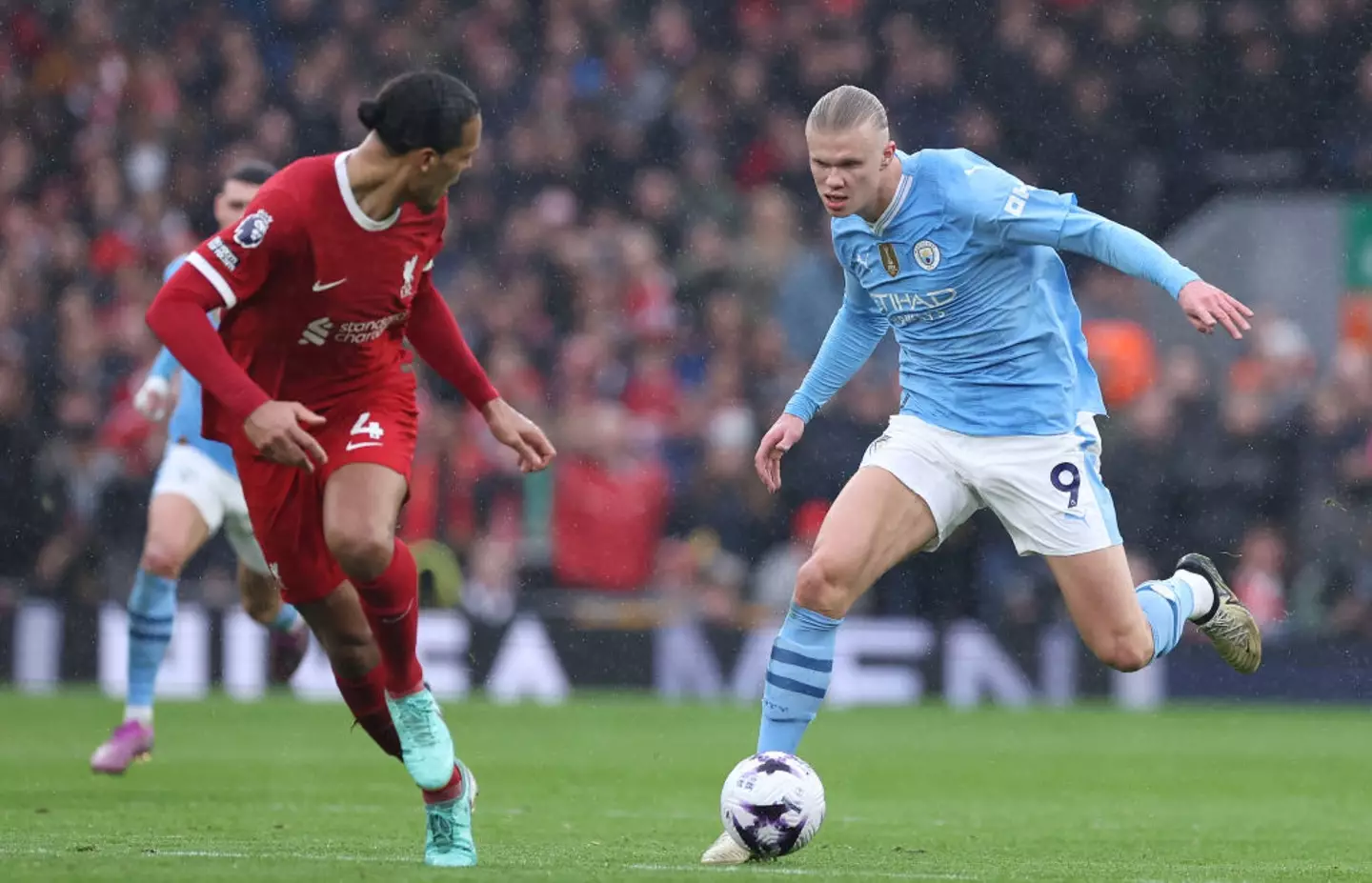 Van Dijk vs Haaland- Getty