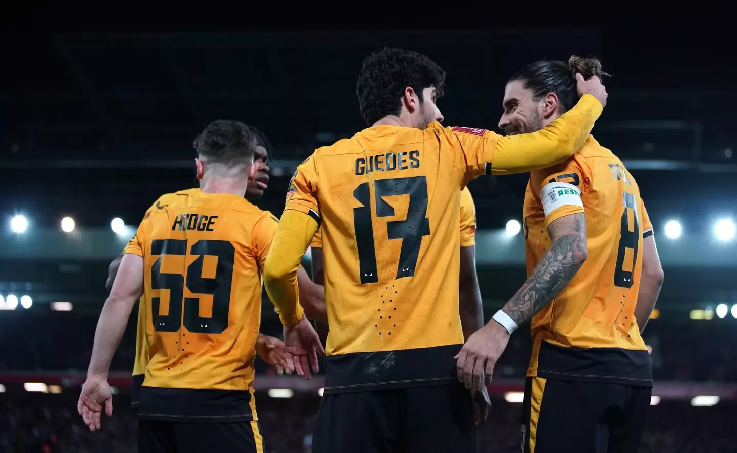 Guedes celebrates his goal. Image: Alamy