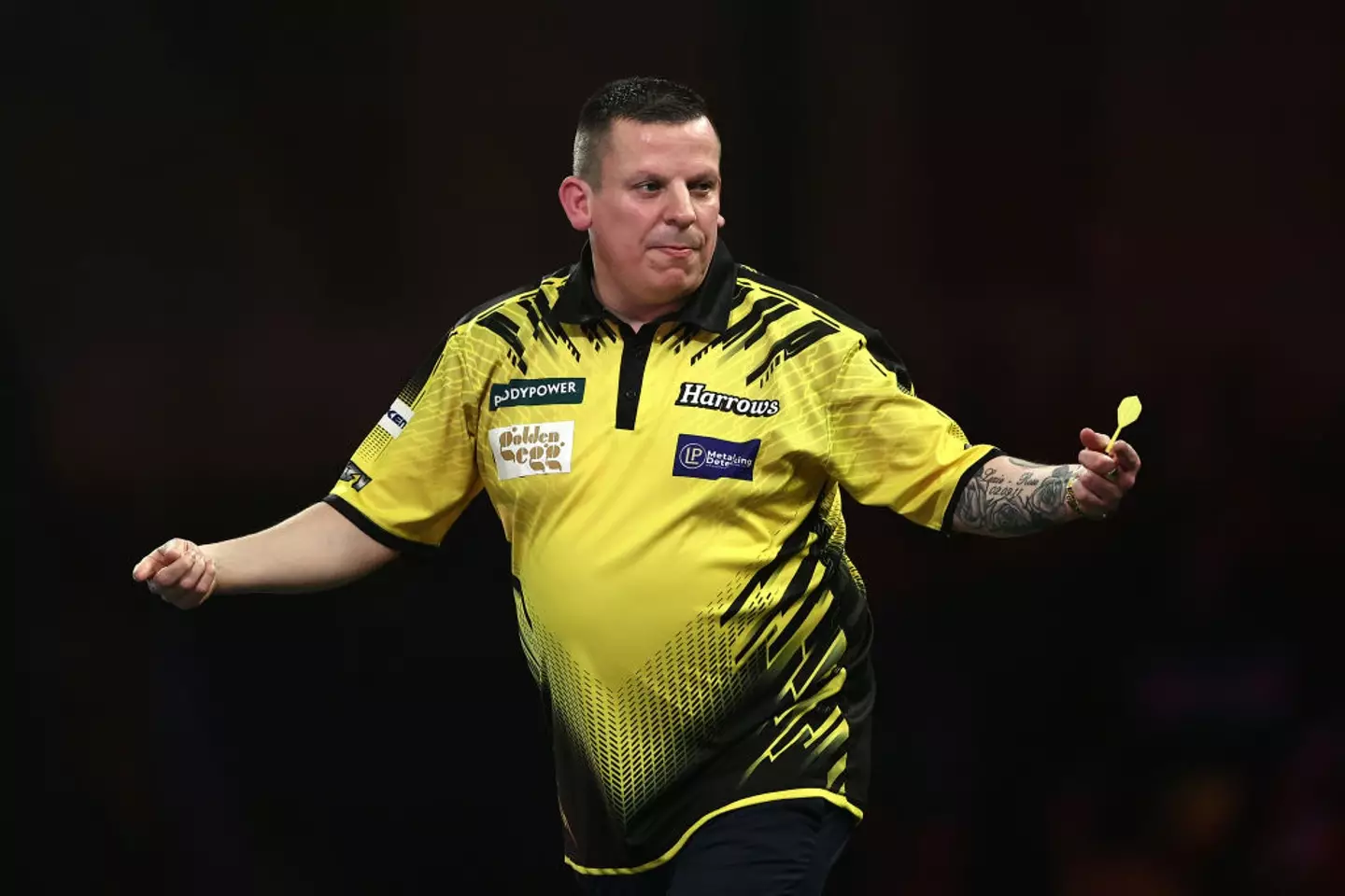 Dave Chisnall lost to Ricky Evans in the second round of the 2025 World Darts Championship (Image: Getty)