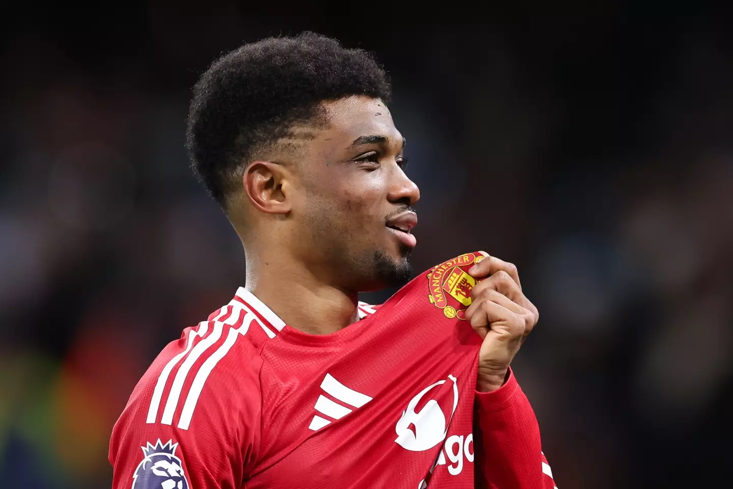 Amad Diallo celebrates with the Manchester United fans following his side's win at Manchester City. Image: Getty