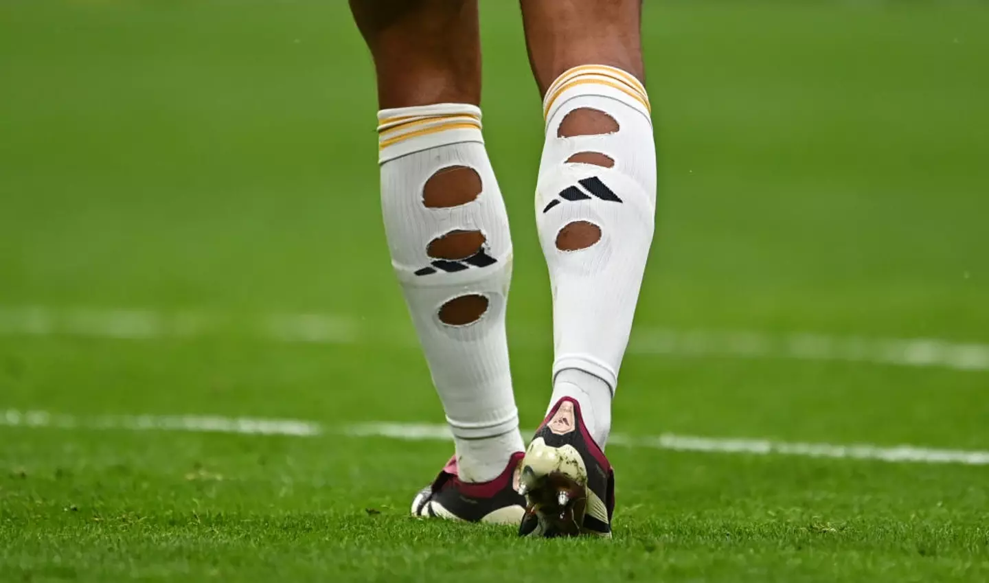 Jude Bellingham regularly cuts holes in his socks (Image: Getty)