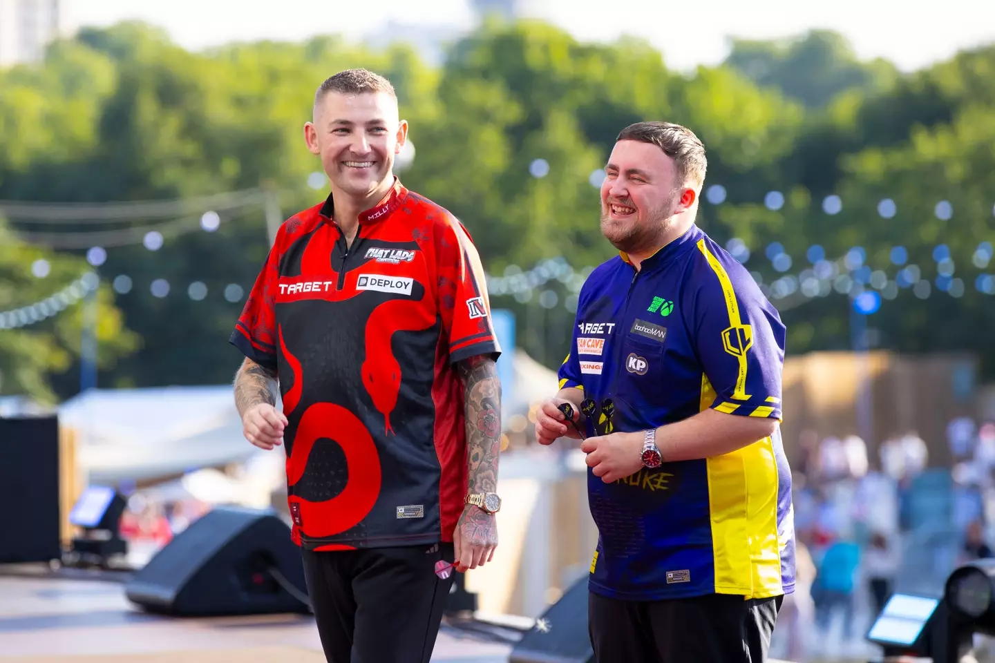 Nathan Aspinall and Luke Littler during the The Hyde Park Darts Championship in July. Image credit: Getty