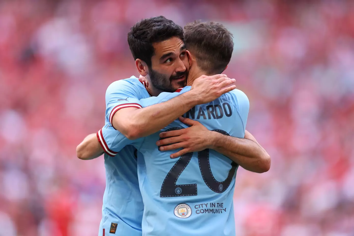 Ilkay Gundogan and Bernardo Silva celebrate after winning the FA Cup. Image: Alamy 