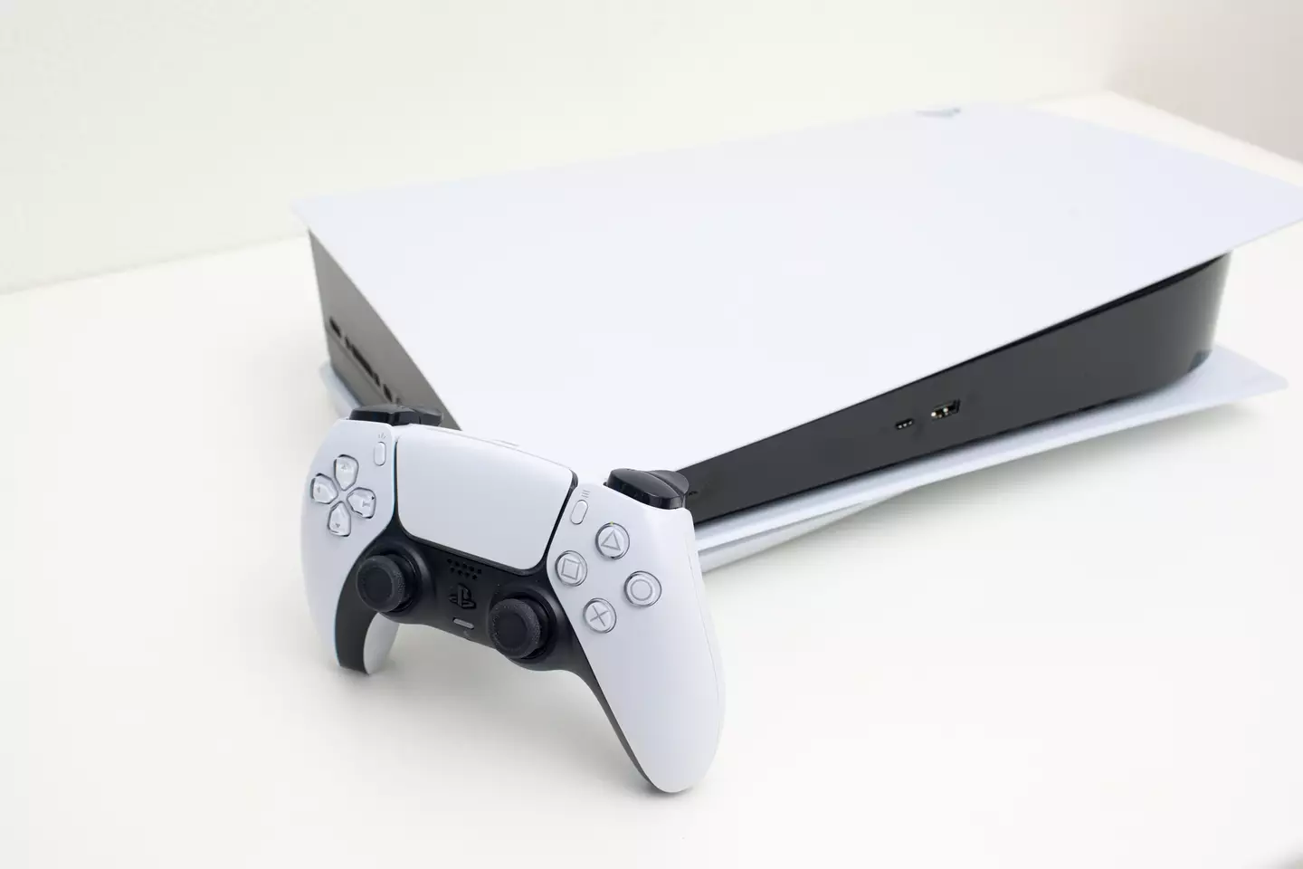 A PlayStation 5 lying horizontally (Getty Images)