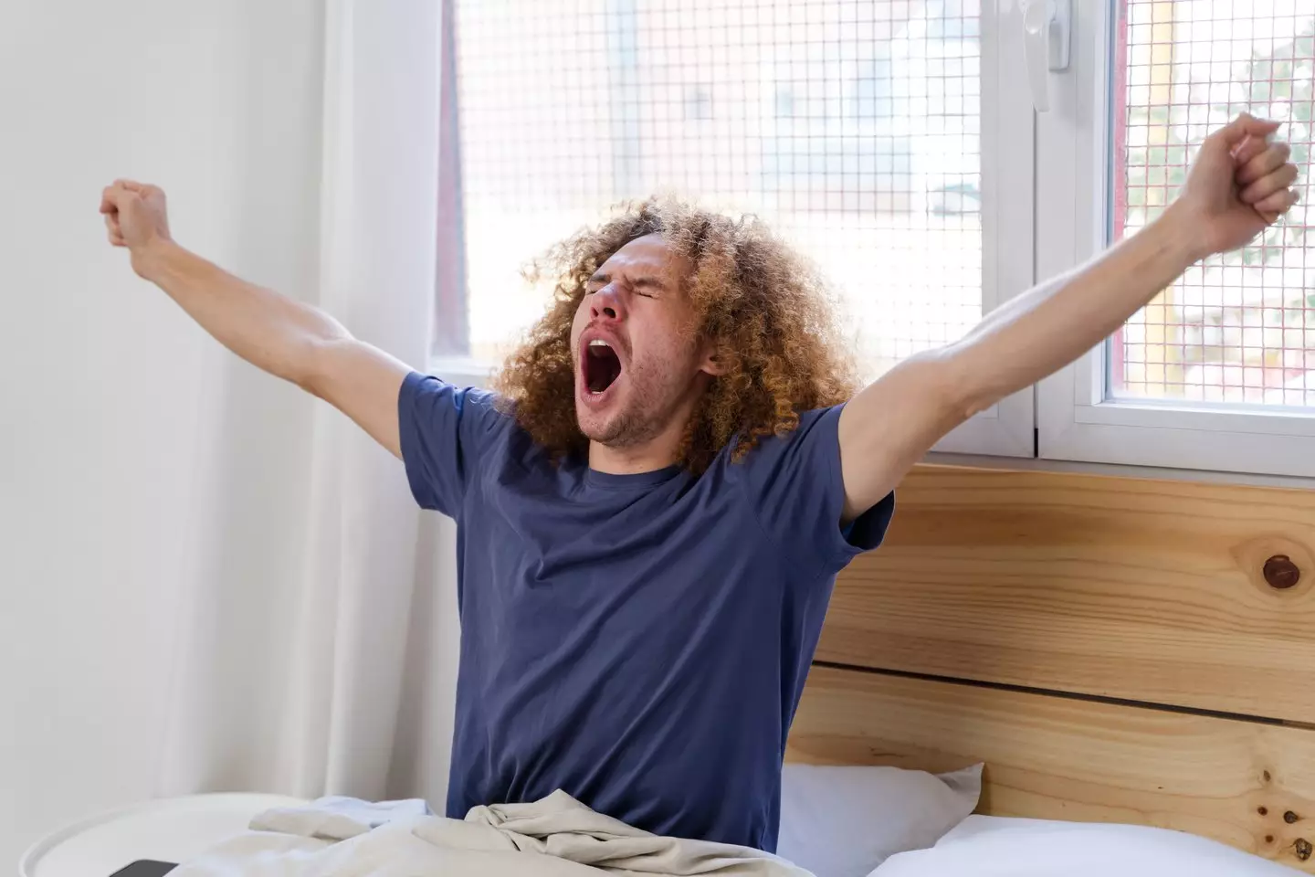 Yawning has a surprisingly powerful role in the body (Creative Images Lab/Getty)