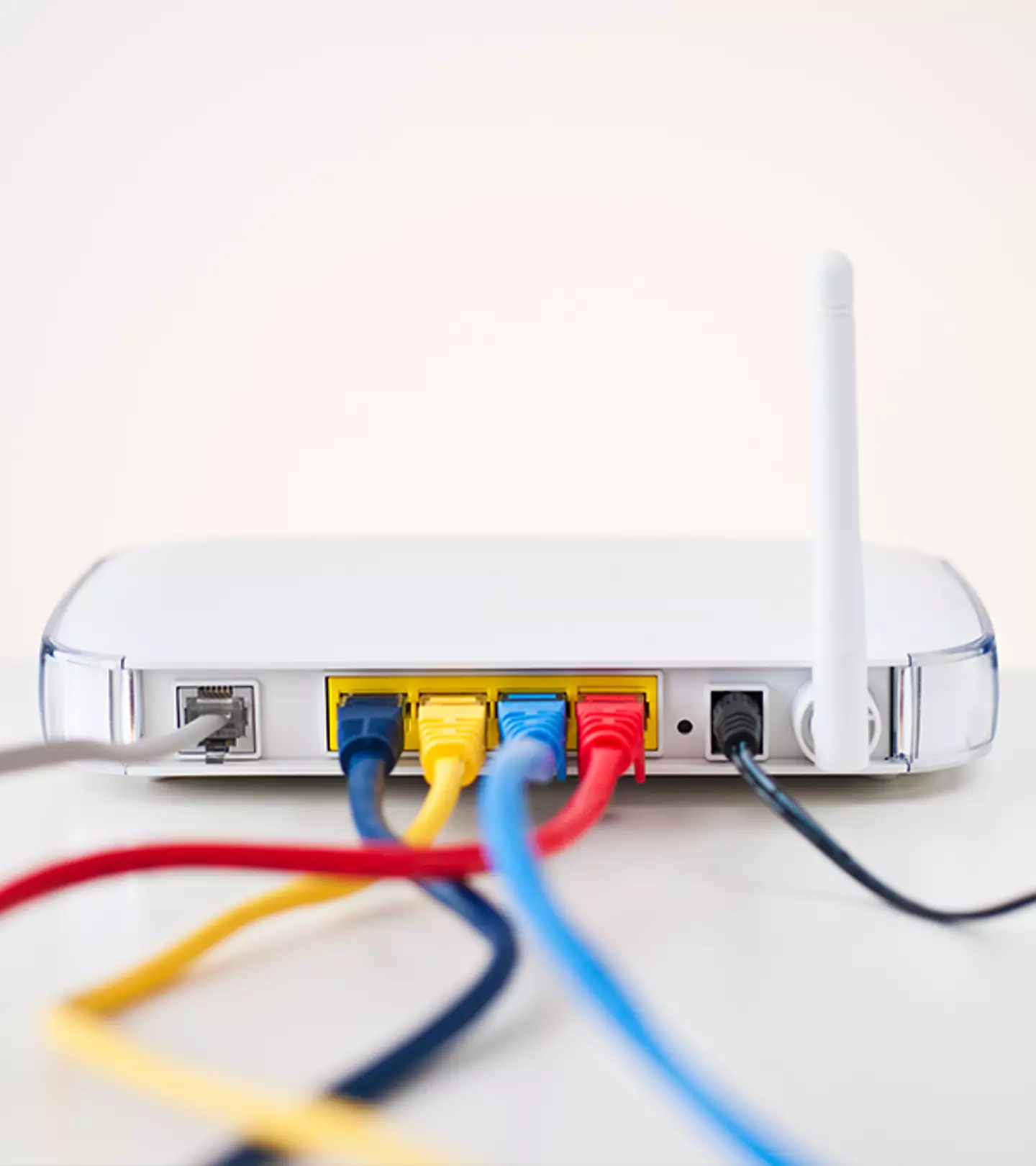 Routers should be placed in a central, elevated position, away from any interference /Tetra Images/Getty Images