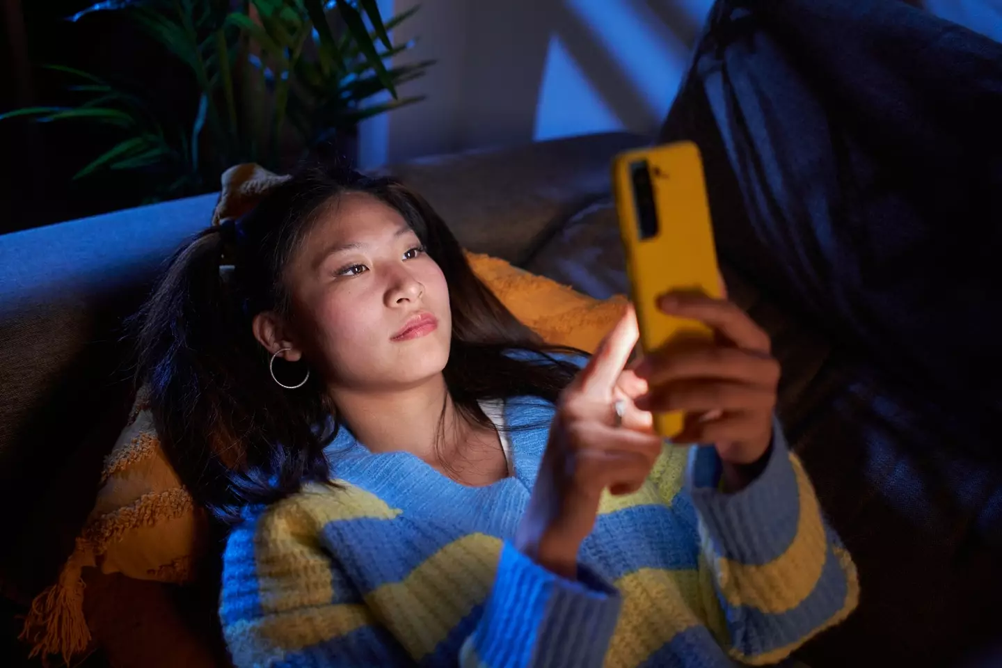 Social media is filled with AI-generated content. (Carlos Barquero/Getty)