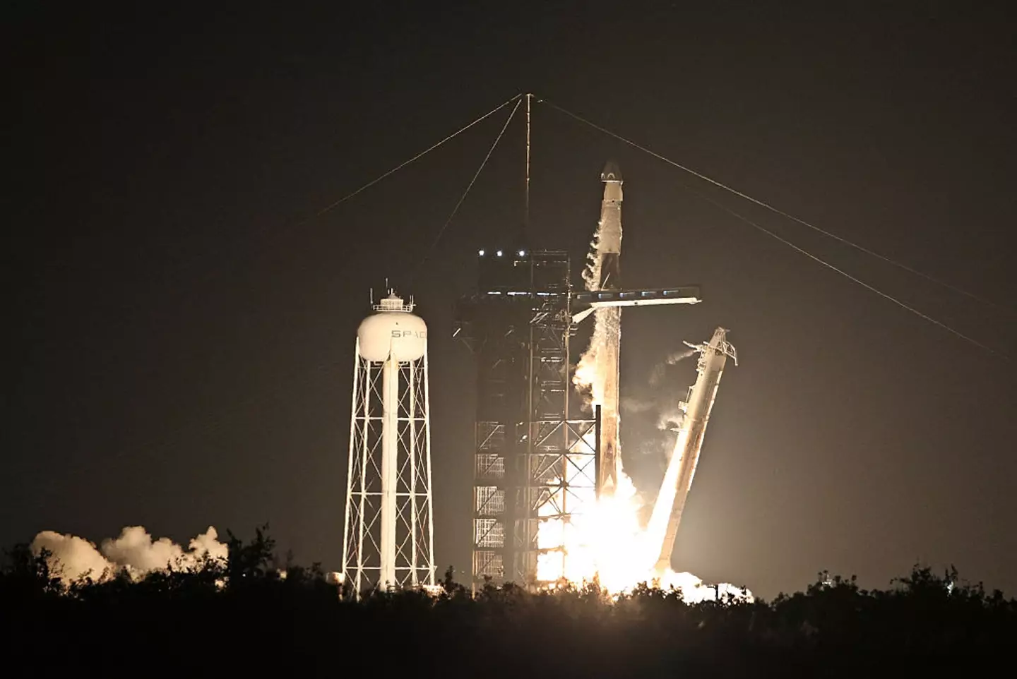 New tariffs will almost certainly cause significant delays in the space industry (Gregg Newton/AFP via Getty Images)